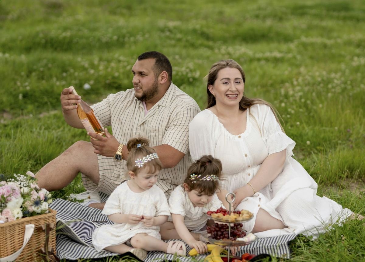 Family enjoying a picnic in High Park during Labor Day