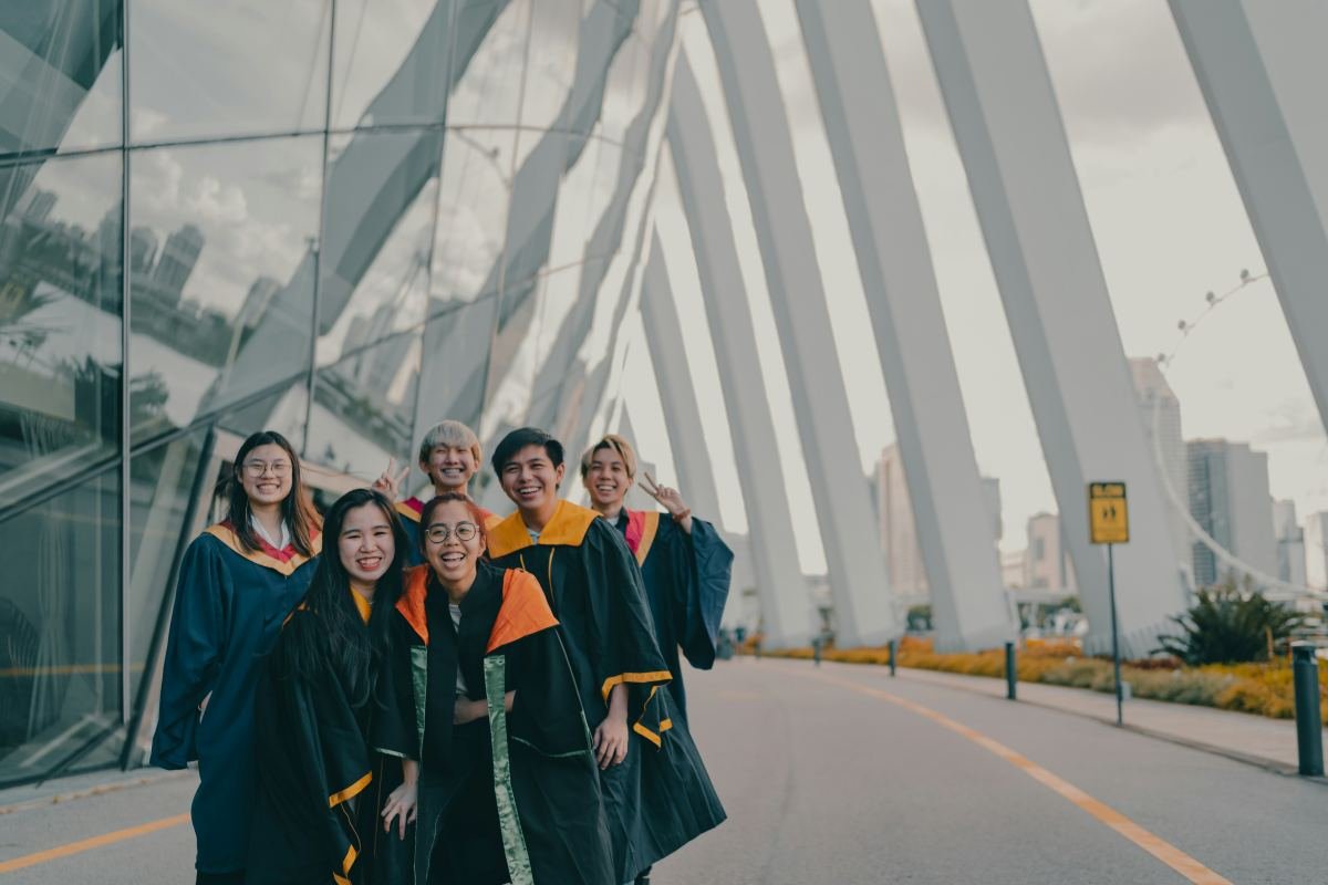 International students celebrating graduation in Canada